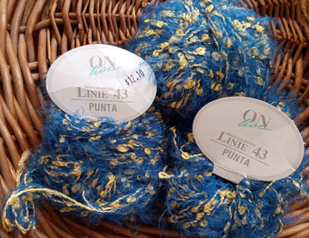 670dca8034be6e479edf2839_bluegoldyarns_1772556273864.jpg