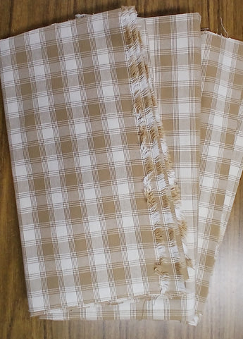 670dca8034be6e479edf2839_plaid-tan-1_1784372904722.jpg