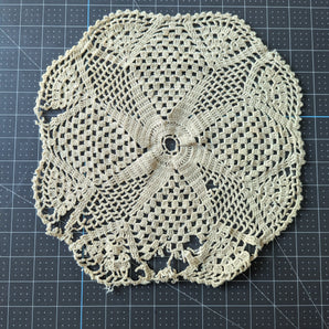 Damaged Off White Doily